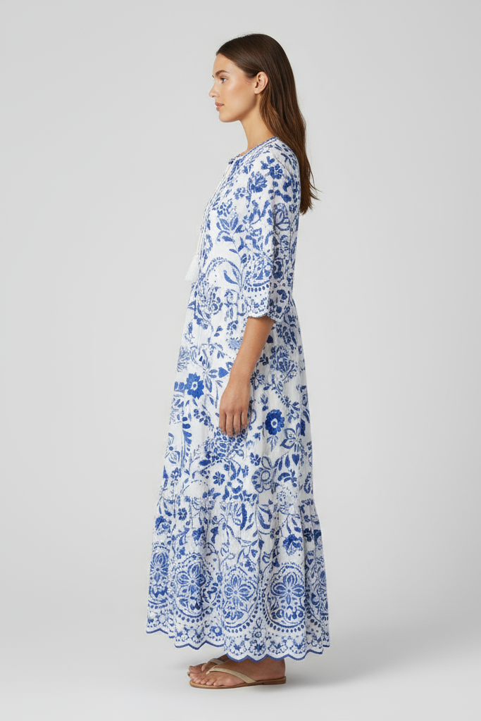 Modelo virada para o lado esquerdo - vestido azul